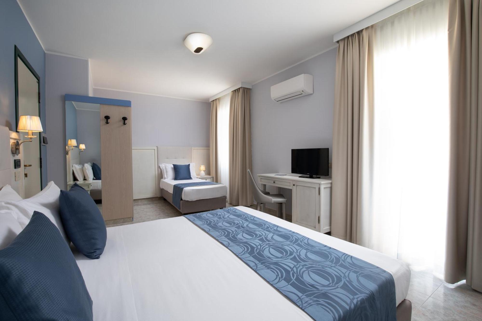 Hotel Rosa Dei Venti Castelsardo Bagian luar foto