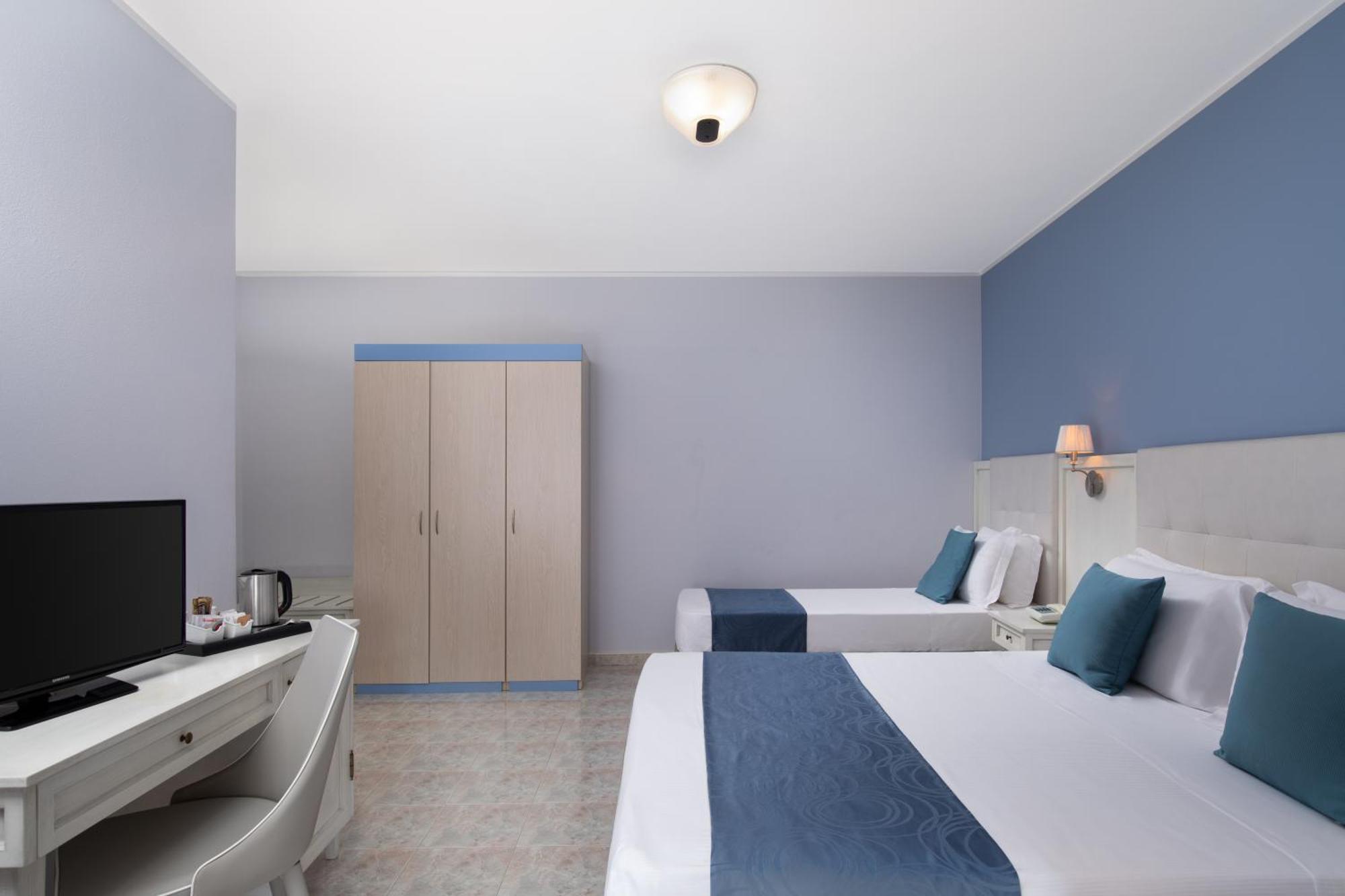 Hotel Rosa Dei Venti Castelsardo Bagian luar foto