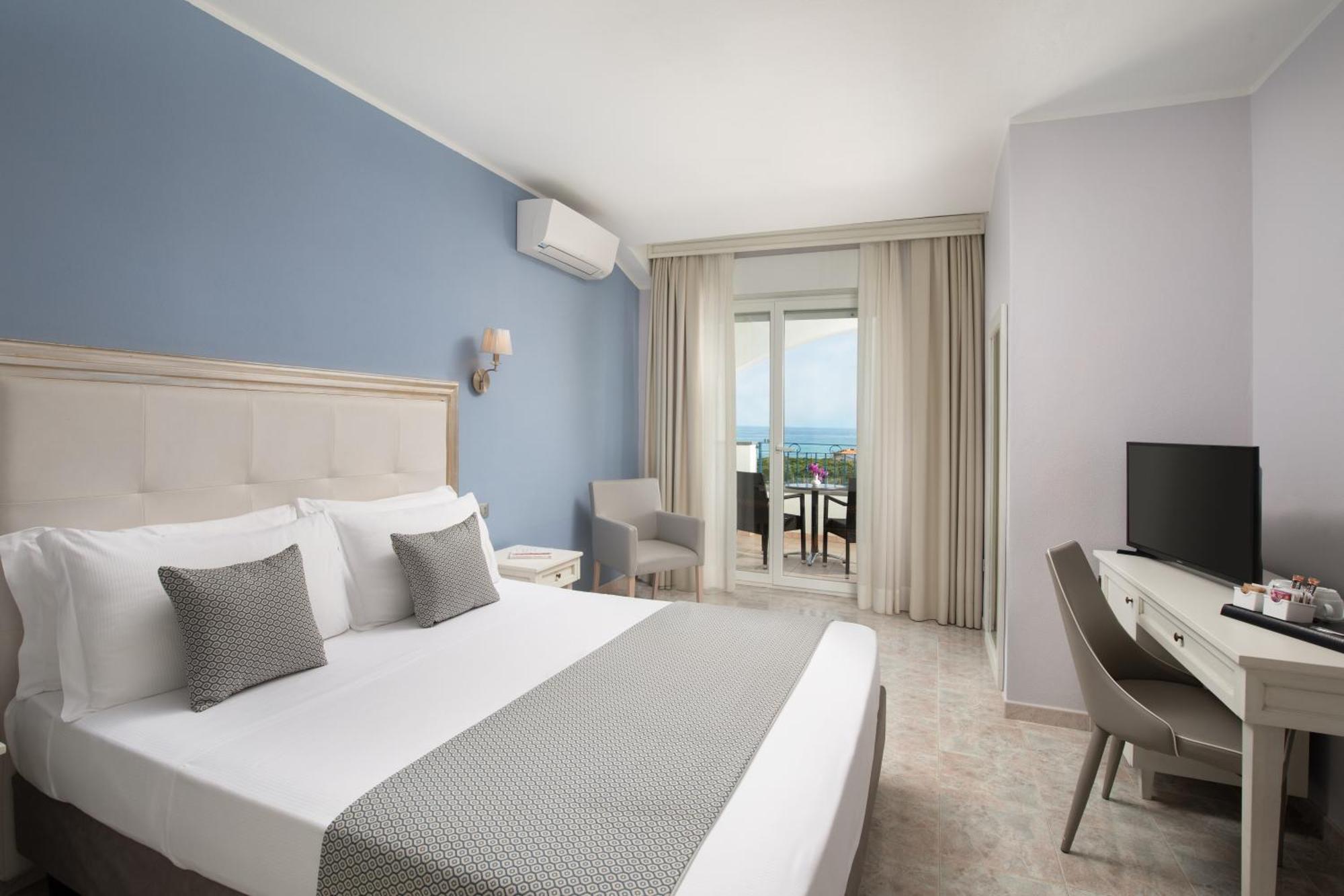 Hotel Rosa Dei Venti Castelsardo Bagian luar foto